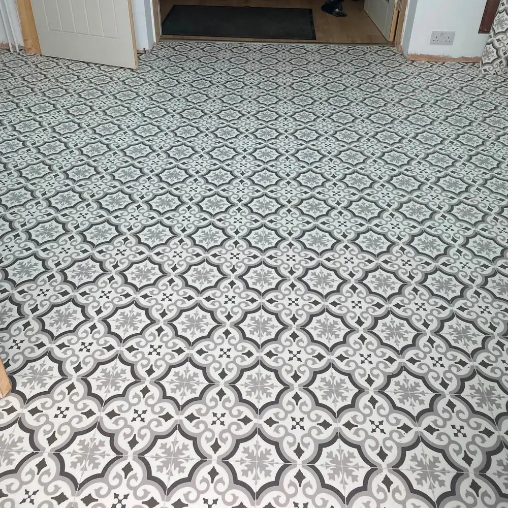 Grey and white patterned flooring fitted in a bright interior