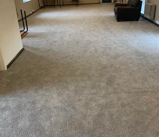 Grey carpet fitted throughout a large commercial or community space